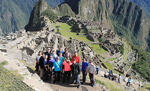 A group of people at Machu Pichu. South America.